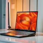 ASUS Zenbook Pro 16X OLED with dial and stylus on a creative desk