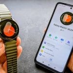 Samsung Galaxy Watch 7 on a user's wrist showing heart rate and time on screen
