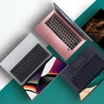 Professional woman comparing laptops in modern electronics store - Ultimate laptop buying guide 2025 for choosing the perfect computer