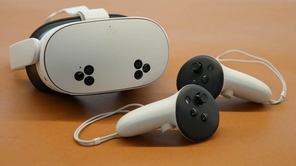 Meta Quest 3S VR headset front view showing controllers and passthrough cameras
